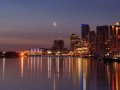 downtown vancouver at dawn with crescent moon